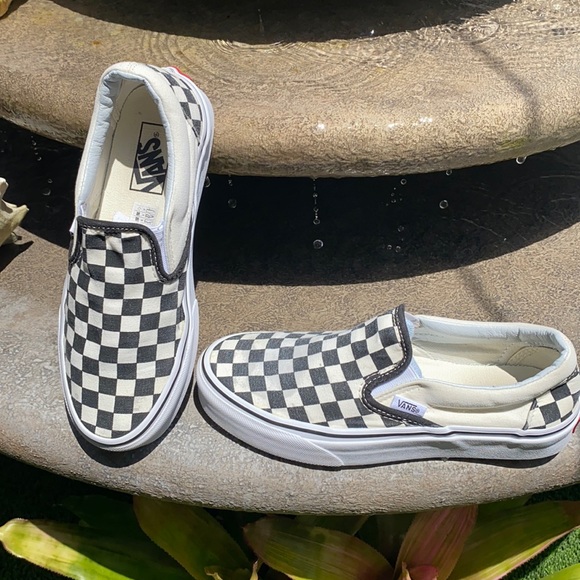 Vans checker board print slip on shoe